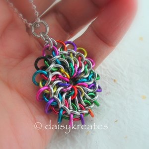 Chainmaille Mandala Pendant's colors reminiscent of Tibetan sand mandala