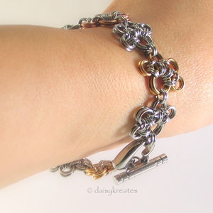 Annie's Petite Paw Prints Bracelet in Mixed Metals with Heart Clasp
