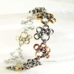Annie's Petite Paw Prints Bracelet in Mixed Metals with Heart Clasp