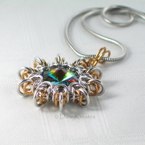 Classic Byzantine weave forms lacy frame for the focal stone