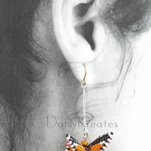 Each Monarch butterfly earring can swivel for front or back side view