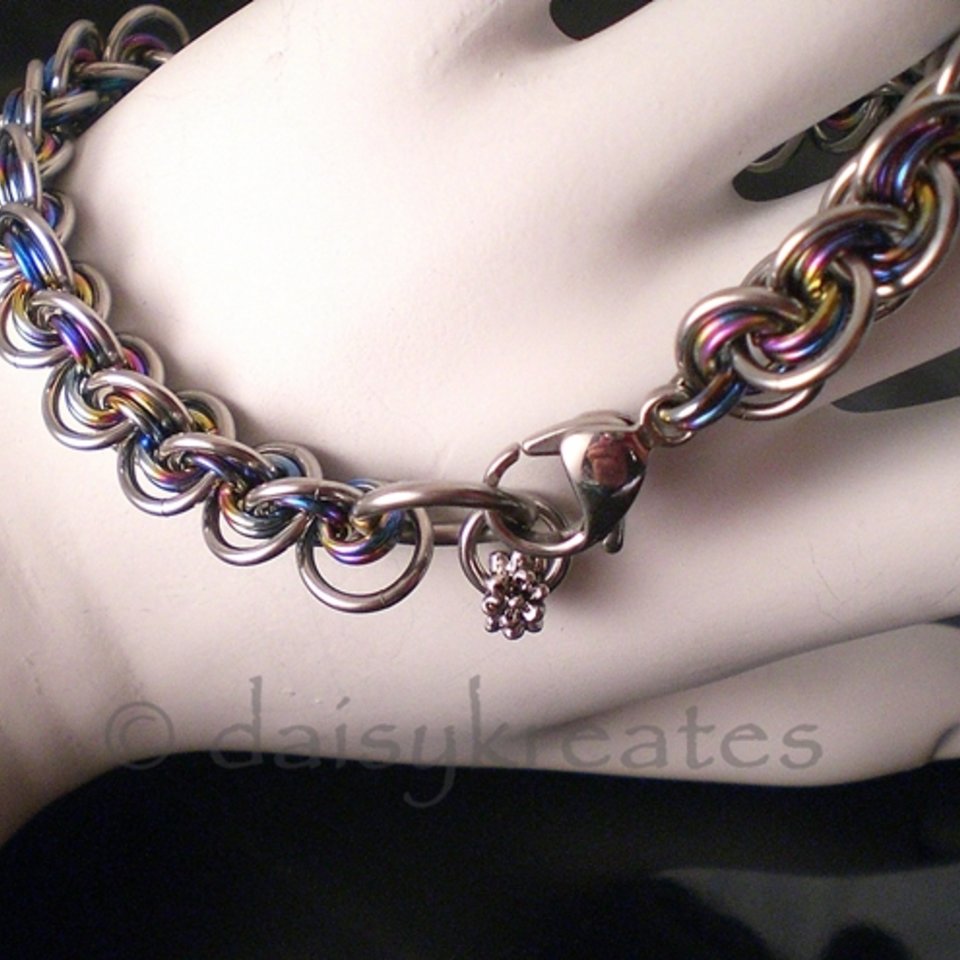 3x3 Wave Bracelet in stainless steel and rainbow anodized niobium