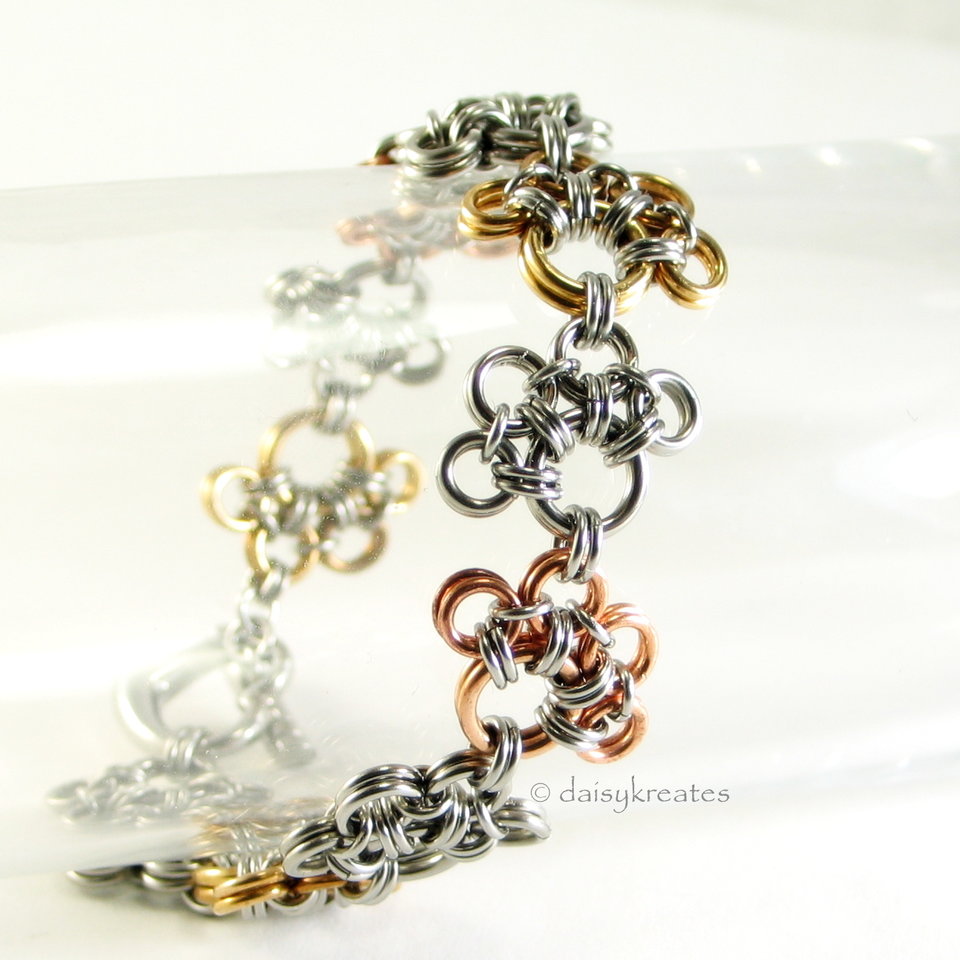 Annie's Petite Paw Prints Bracelet in Mixed Metals with Heart Clasp