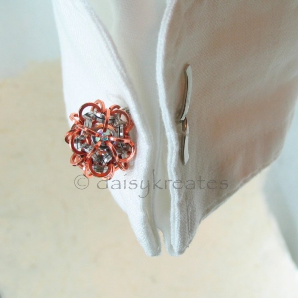 The cuff links can be worn with or without the tassels