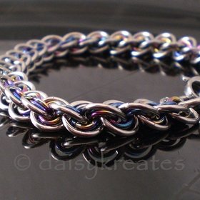 3x3 Wave Bracelet in stainless steel and rainbow anodized niobium