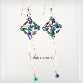 Lovely sterling silver Nox earrings with rainbow hightlights